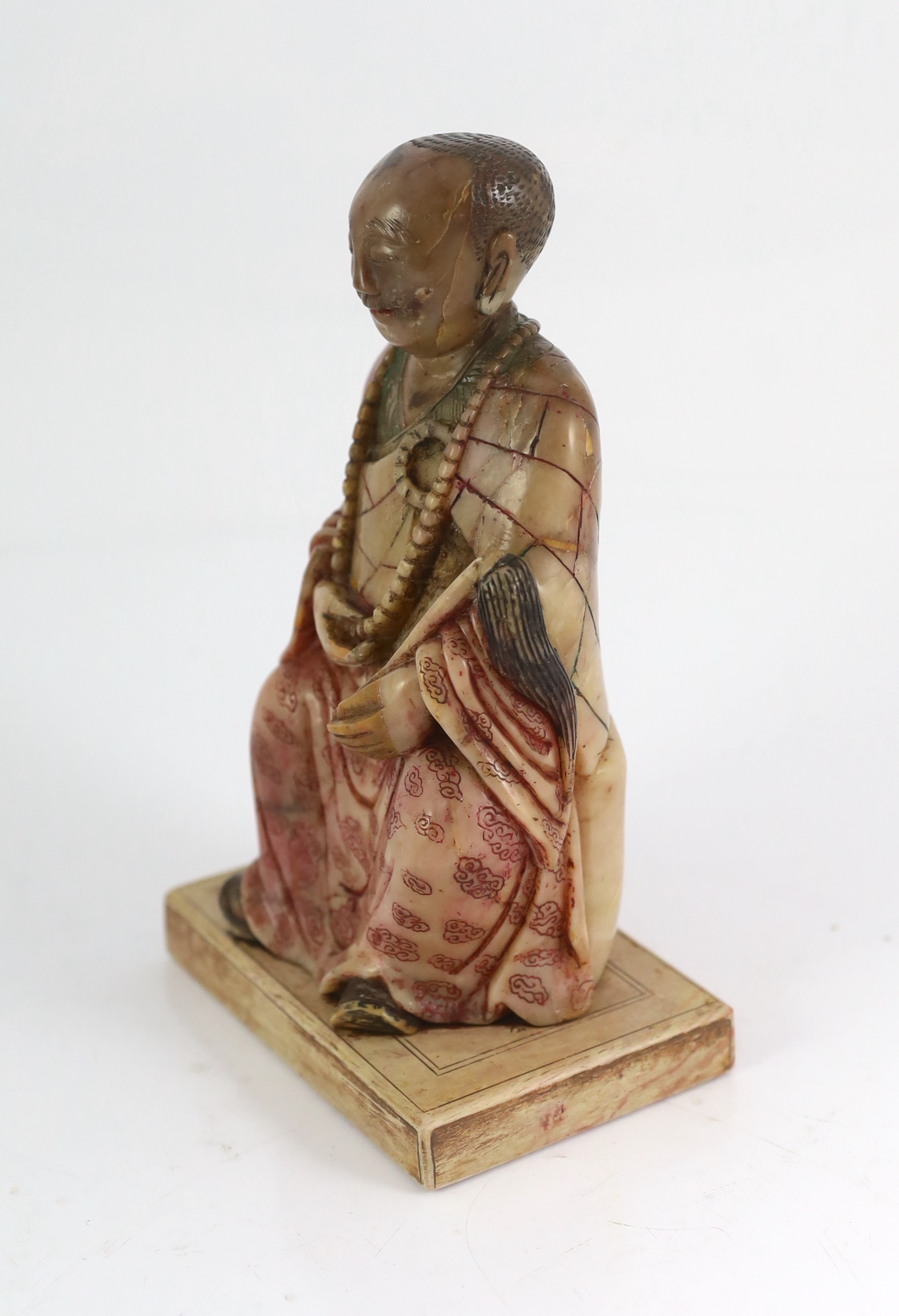 A Chinese late Ming soapstone figure of a luohan, 17th century